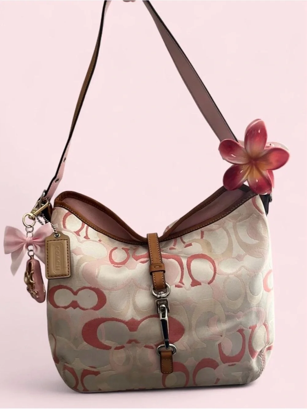 Coach Signature Canvas Hobo Bag in Pink and Tan